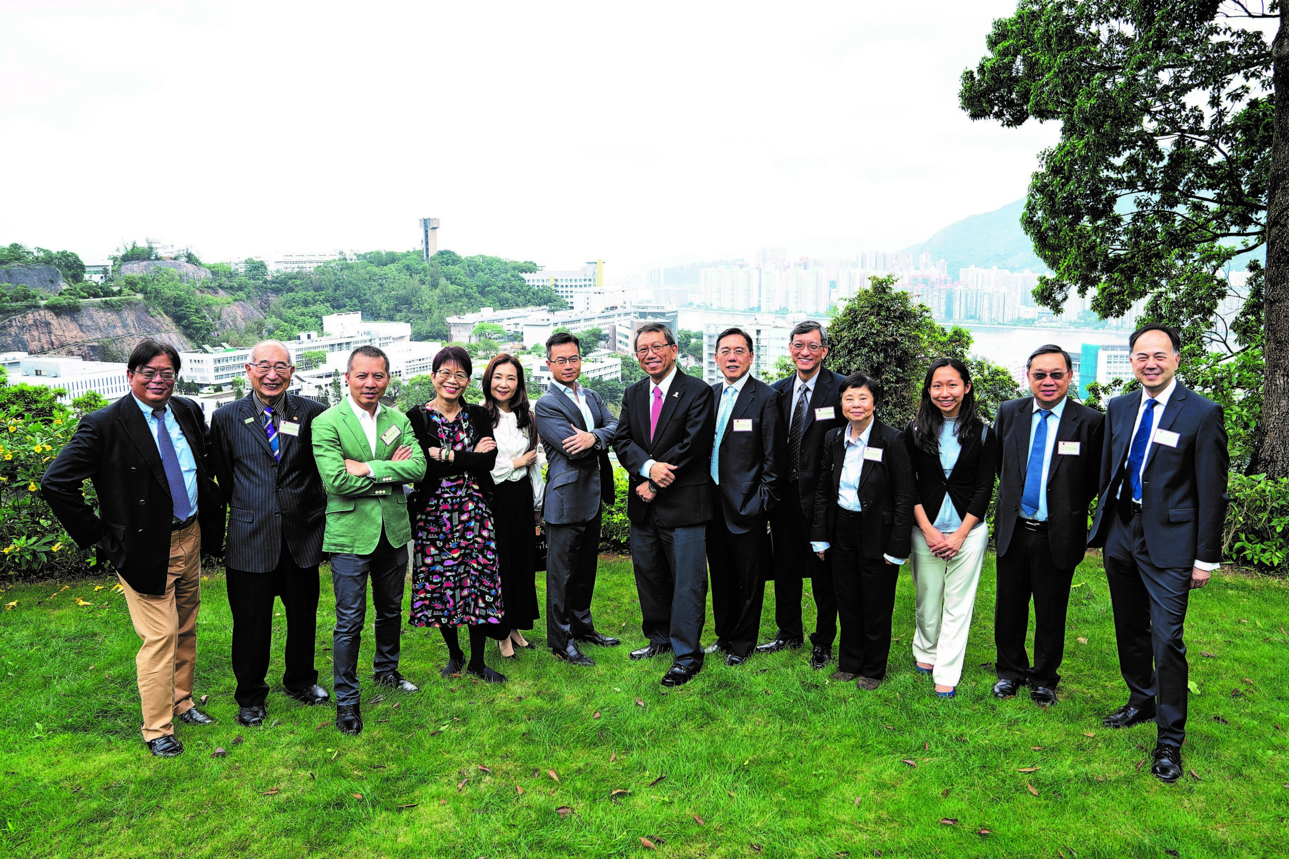 When CUHK launched the Global Alumni Advisory Board in 2018, Peter Hung (6th from right) was one of 12 alumni appointed as members.