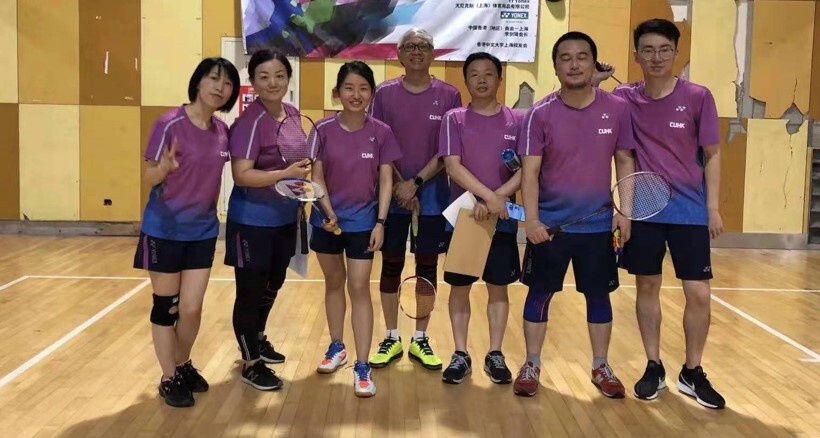 Alumni playing badminton together